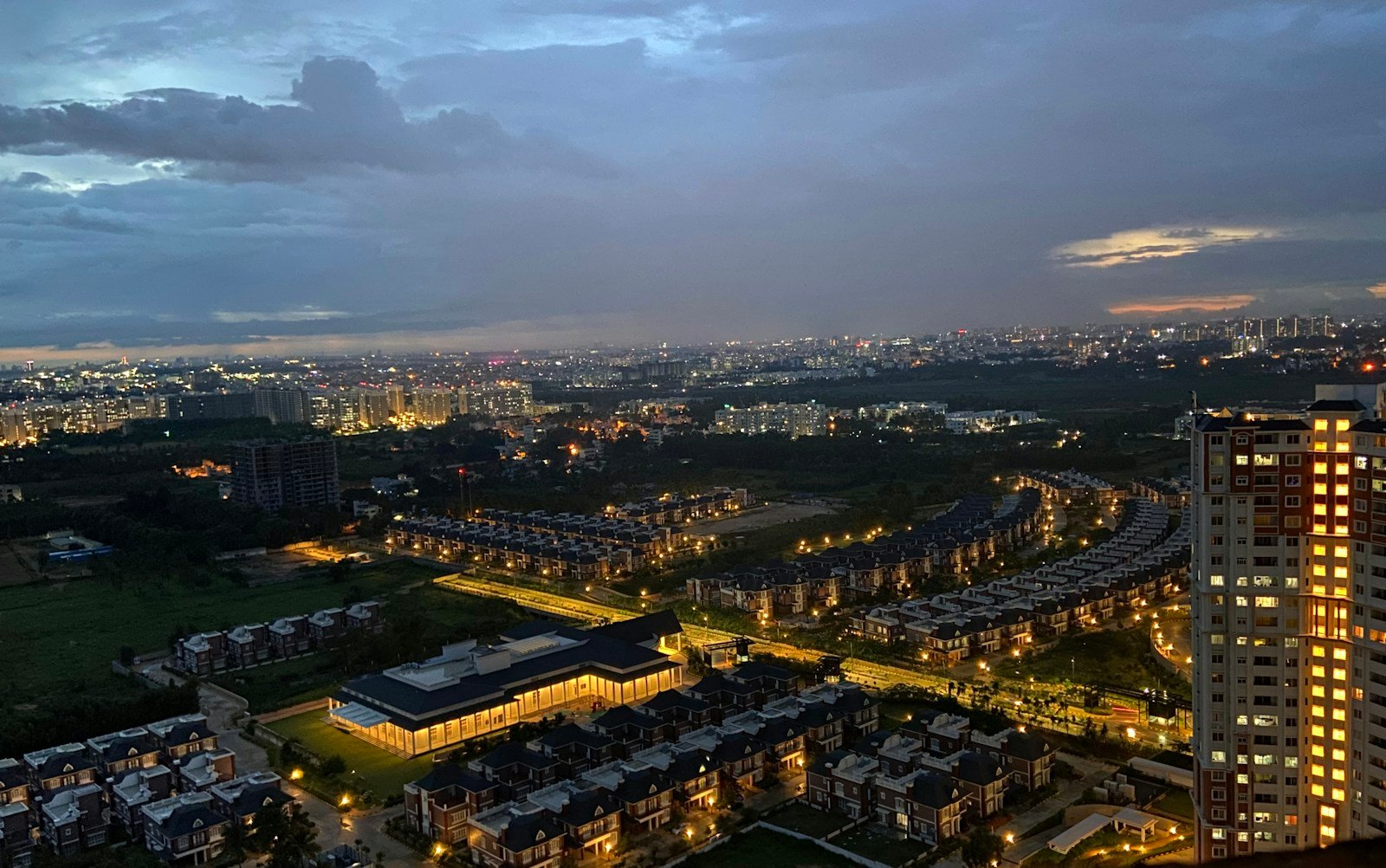 Modern residential property and city skyline representing the Bangalore real estate market in 2026